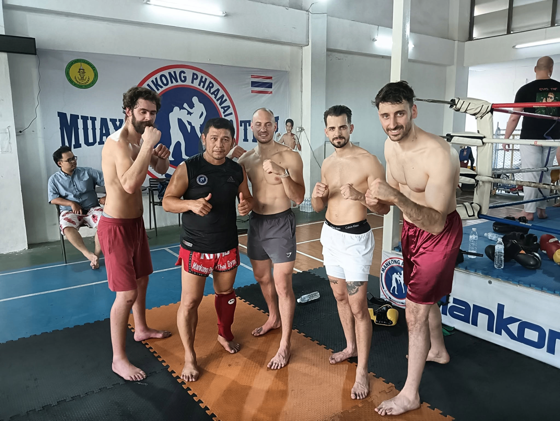 Kru Mas with students after training at Mankong Phranai gym